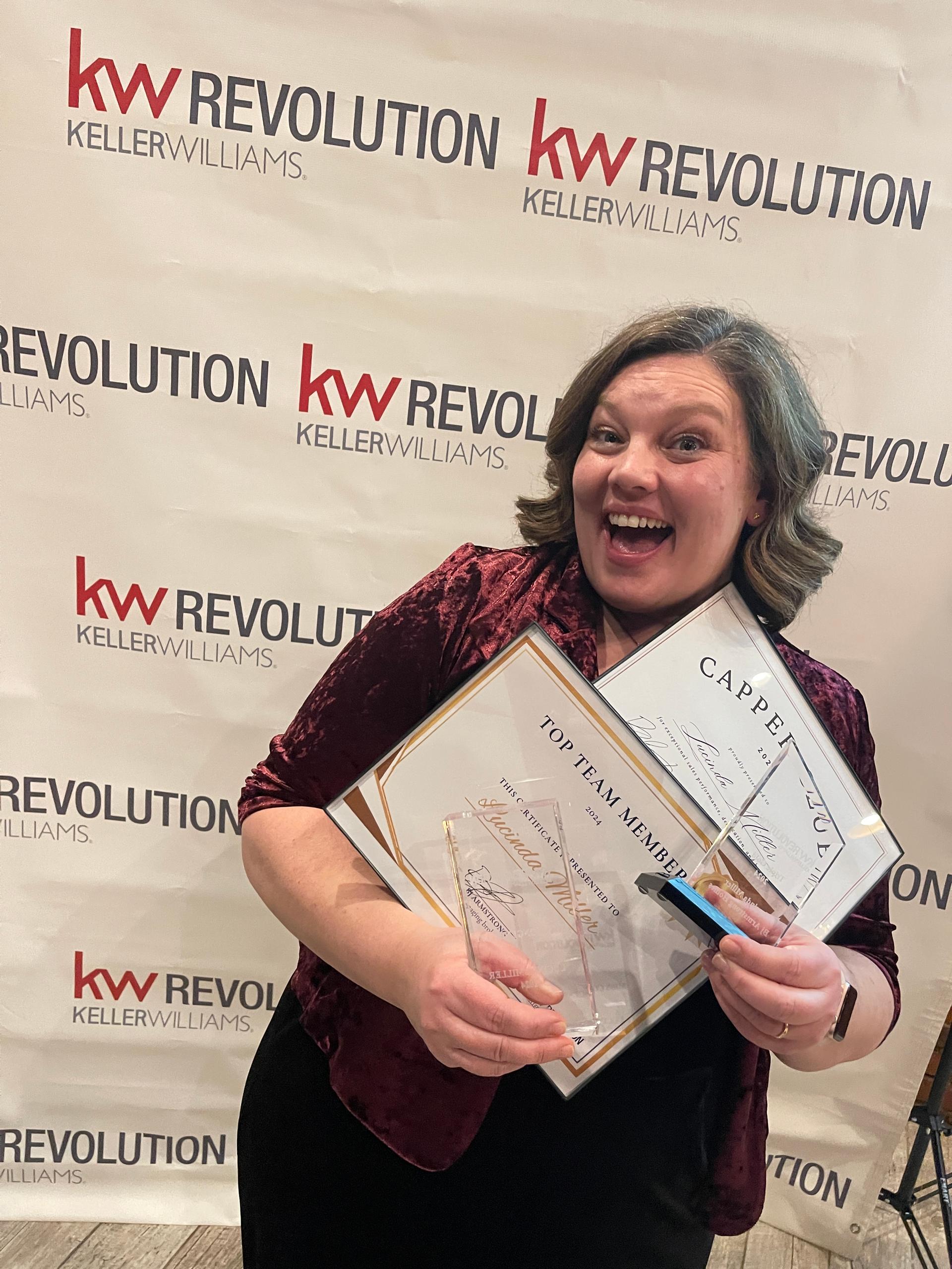 Lucinda Miller with her Keller Williams awards